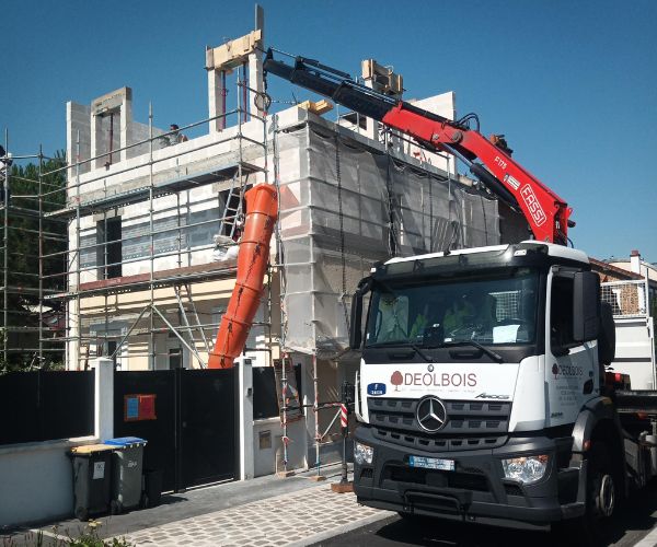 Livraison du bois de charpente pour surélévation à Bois-Colombes